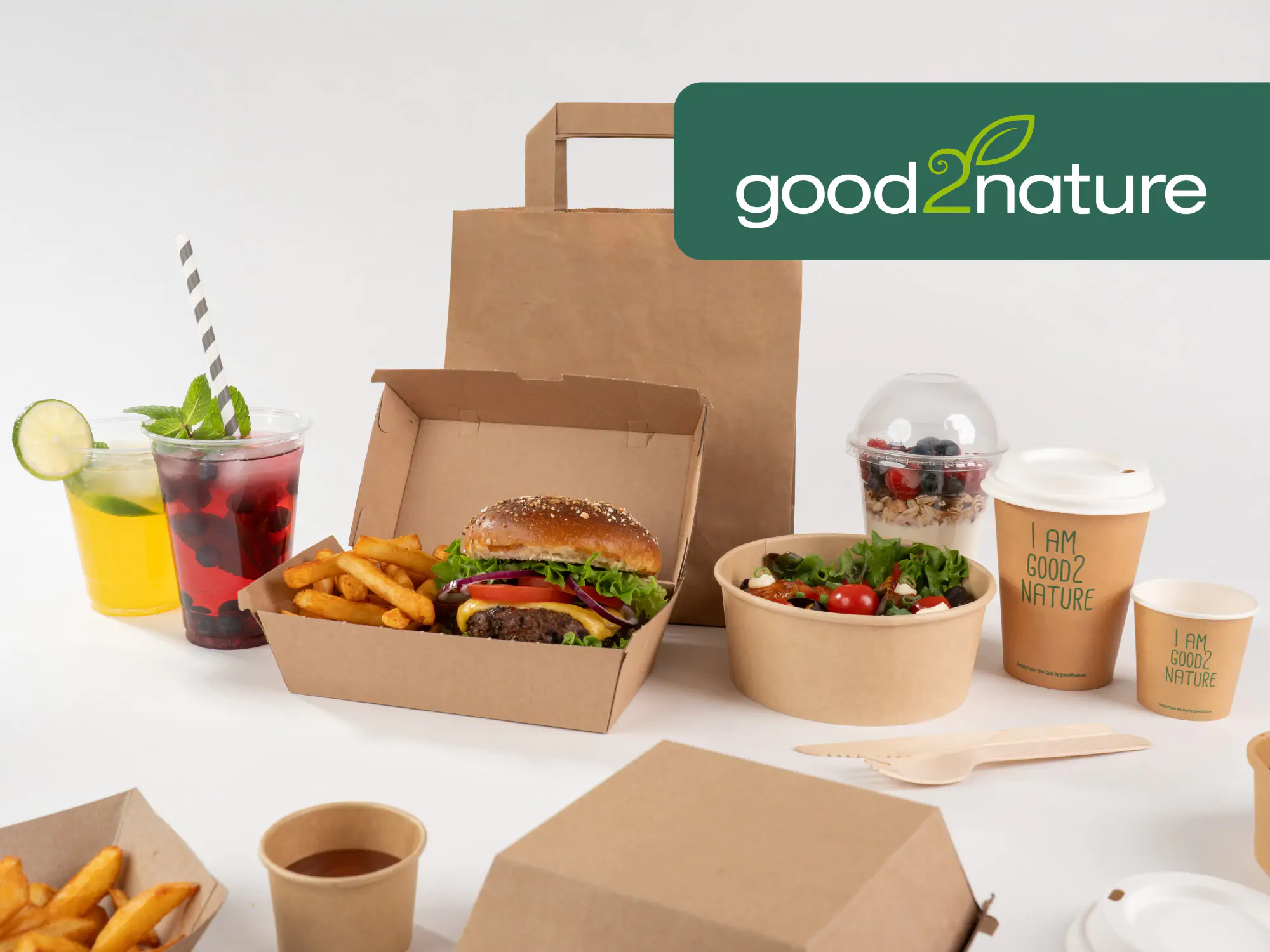 Nachhaltige Verpackungen wie Kaffeebecher, Bowl, Schale, Box und Tragetasche sind nebeneinander angeordnet - ggod2nature